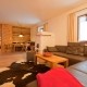 5 Sterne Appartement Ferlhof Krün Löwenzahn Wohnzimmer Couch